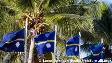 FILE - This shows national flags in Nauru for the Pacific Islands Forum on the tiny Pacific nation of Nauru, on Sept. 3, 2018. The Pacific Island nation of Nauru says it is switching diplomatic recognition from Taiwan to China. The move on Monday, Jan. 15, 2024 leaves Taiwan with 12 diplomatic allies around the world. (Jason Oxenham/Pool Photo via AP, File)