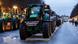 Tractors are parked near the Brandenburg Gate, as German farmers take part in a protest against the cut of vehicle tax subsidies Tractors are parked near the Brandenburg Gate, as German farmers take part in a protest against the cut of vehicle tax subsidies