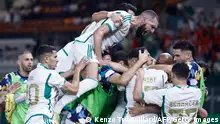 15.01.2024
Algeria players celebrate after Algeria's forward #9 Baghdad Bounedjah scored their team's first goal during the Africa Cup of Nations (CAN) 2024 group D football match between Algeria and Angola at Stade de la Paix in Bouake on January 15, 2024. (Photo by KENZO TRIBOUILLARD / AFP) (Photo by KENZO TRIBOUILLARD/AFP via Getty Images)