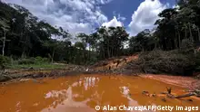 Picture of an illegal mining camp, known as garimpo, taken during an operation by the Brazilian Institute of Environment and Renewable Natural Resources (IBAMA) against Amazon deforestation at the Yanomami territory in Roraima State, Brazil, on February 24, 2023. - In early February Brazil deployed hundreds of police and soldiers to evict gold miners accused of causing a humanitarian crisis on the Yanomami Indigenous reservation, as thousands of the illegal miners fled. Justice Minister Flavio Dino said authorities estimate at least 15,000 people have illegally invaded the protected Amazon rainforest reservation, where Indigenous leaders accuse gold miners of raping and killing inhabitants, poisoning their water with mercury and triggering a food crisis by destroying the forest. (Photo by ALAN CHAVES / AFP) (Photo by ALAN CHAVES/AFP via Getty Images)