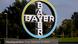 Logo of Bayer at its Headquarters of the crop science division, seen in front of trees Logo of Bayer at its Headquarters of the crop science division, seen in front of trees