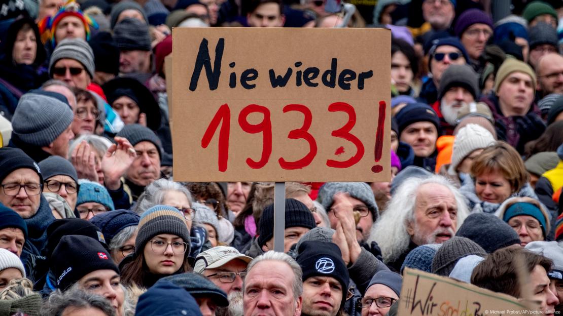 People gather as they protest against the AfD party and right-wing extremism in Frankfurt