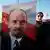 Members of Russia's Communist party hold a large portrait of Vladimir Lenin on Red Square in Moscow