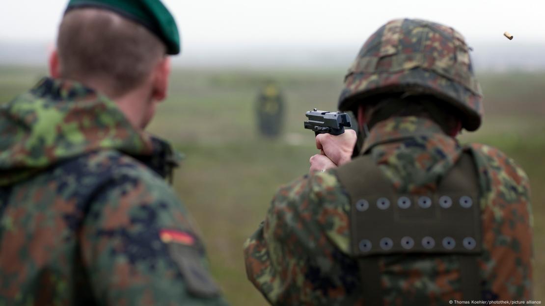 Two German soldiers firing at a target