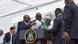 Presidential aides rush to surround Liberia's President Joseph Boakai, who suddenly paused his inaugural speech Presidential aides rush to surround Liberia's President Joseph Boakai, who suddenly paused his inaugural speech
