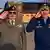 Libya's strongman Khalifa Hiftar (left) salutes next to Russia's Deputy Defence Minister Yunus-bek Yevkurov (R)