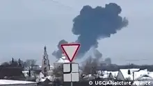 23.01.2024
In this photo taken from validated UGC video smoke rises from the scene of a warplane crash at a residential area near Yablonovo, Belgorod region, Wednesday, Jun. 23, 2024. Russia says a military transport plane that was carrying 65 Ukrainian prisoners of war has crashed in a Russian region near Ukraine. (Validated UGC video via AP)