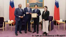 This handout photo by the Taiwan Presidential Office taken and released on January 25, 2024 shows (L-R) US Representative Ami Bera (L), US Representative Mario Diaz-Balart, and Taiwan's President-elect Lai- Ching-te and vice president-elect Hsiao Bi-khim posing for photos at the Presidential Office. Two US lawmakers met with Taiwanese president-elect Lai Ching-te on January 25 to reaffirm Washington's support for the self-ruled island, which China claims as part of its territory. (Photo by Handout / Taiwan Presidential Office / AFP) / RESTRICTED TO EDITORIAL USE - MANDATORY CREDIT AFP PHOTO / TAIWAN PRESIDENTIAL OFFICE - NO MARKETING NO ADVERTISING CAMPAIGNS - DISTRIBUTED AS A SERVICE TO CLIENTS