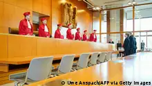 23/01/2024**Members of the Second Senate of Germany's Federal Constitutional Court (Bundesverfassungsgericht) take their seats at the court in Karlsruhe, southern Germany, on January 23, 2024, before their judgement on party funding for the extreme right-wing Die Heimat (formerly NPD) party: (L-R) Peter Frank, Thomas Offenloch, Astrid Wallrabenstein, vice-president of the Court and chairman of the Second Senate Doris Koenig, Christine Langengeld, Rhona Fetzer and Holger Woeckel. The right-wing extremist party Die Heimat - formerly the NPD - will be excluded from state funding for six years. This means that the party and donations to it will no longer benefit from tax benefits, as the Federal Constitutional Court decided. (Photo by Uwe Anspach / POOL / AFP) (Photo by UWE ANSPACH/POOL/AFP via Getty Images)