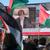 Φιλοπαλαιστίνιοι ακτιβιστές κυματίζουν σημαίες έξω από το Διεθνές Δικαστήριο της Χάγης της Ολλανδίας καθώς παρακολουθούν την προδικαστική απόφαση του κορυφαίου δικαστικού οργάνου των Ηνωμένων Εθνών