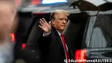 Former U.S. President Donald Trump gestures to his supporters, as he departs for his second civil trial after E. Jean Carroll accused Trump of raping her decades ago, outside a Trump Tower in the Manhattan borough of New York City, U.S., January 26, 2024. REUTERS/Eduardo Munoz