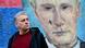 Sedokosi muškarac (prednja strana slike) kritički gleda preko ramena, gde se vide grafiti sa licem ruskog predsednika Vladimira Putina; Putinove oči su očigledno bile poprskane crnom bojom Sedokosi muškarac (prednja strana slike) kritički gleda preko ramena, gde se vide grafiti sa licem ruskog predsednika Vladimira Putina; Putinove oči su očigledno bile poprskane crnom bojom