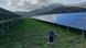 A child runs between two rows of solar panels in a field, mountains can be seen in the background. The Hyperion solar park, Stymfalia, Peloponnese, Greece A child runs between two rows of solar panels in a field, mountains can be seen in the background. The Hyperion solar park, Stymfalia, Peloponnese, Greece