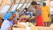 Two nurses are seen registering a patient at a pop-up cholera clinic in Harare in November, 2023 Two nurses are seen registering a patient at a pop-up cholera clinic in Harare in November, 2023