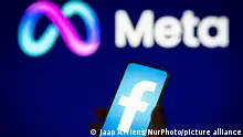 A Facebook logo is seen on a mobile device screen with a Meta logo in the background in this photo illustration on 31 May, 2023 in Warsaw, Poland. (Photo by Jaap Arriens/NurPhoto)