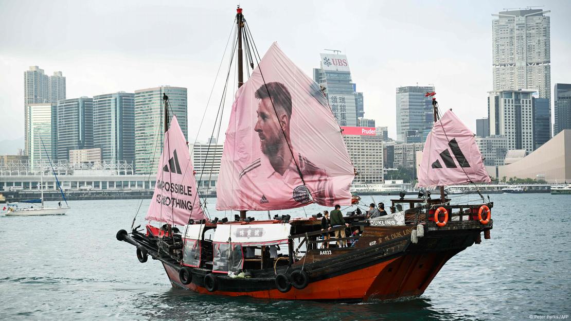 A sailing ship with the face of Inter Miami CF Argentine forward Lionel Messi on its sail sails across Hong Kong’s Victoria Harbour on February 2, 2024, ahead of the friendly football match between Inter Miami CF and Hong Kong Team on February 4, 2024.