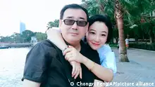 FILE - This undated, file photo released by Chongyi Feng shows Yang Hengjun and his wife Yuan Xiaoliang. Australia says its citizen Yang Hengjun will be tried on espionage charges on Thursday, May 27, amid deteriorating relations between the two countries. Yang has been held since arriving in China in January 2019 and has had no access to family and only limited contact with his legal representation, according to a statement from Australian Foreign Minister Marise Payne.(Chongyi Feng via AP, File)