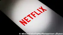 The Netflix logo is displayed on a smartphone screen in Athens, Greece, on December 22, 2023. (Photo by Nikolas Kokovlis/NurPhoto)
