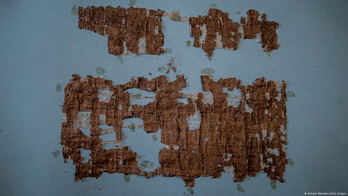 A partially destroyed Herculaneum papyrus scroll 
