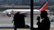 A passenger sips a drink in the food court of the Chhatrapati Shivaji Maharaj International Airport (CSMIA) in Mumbai A passenger sips a drink in the food court of the Chhatrapati Shivaji Maharaj International Airport (CSMIA) in Mumbai