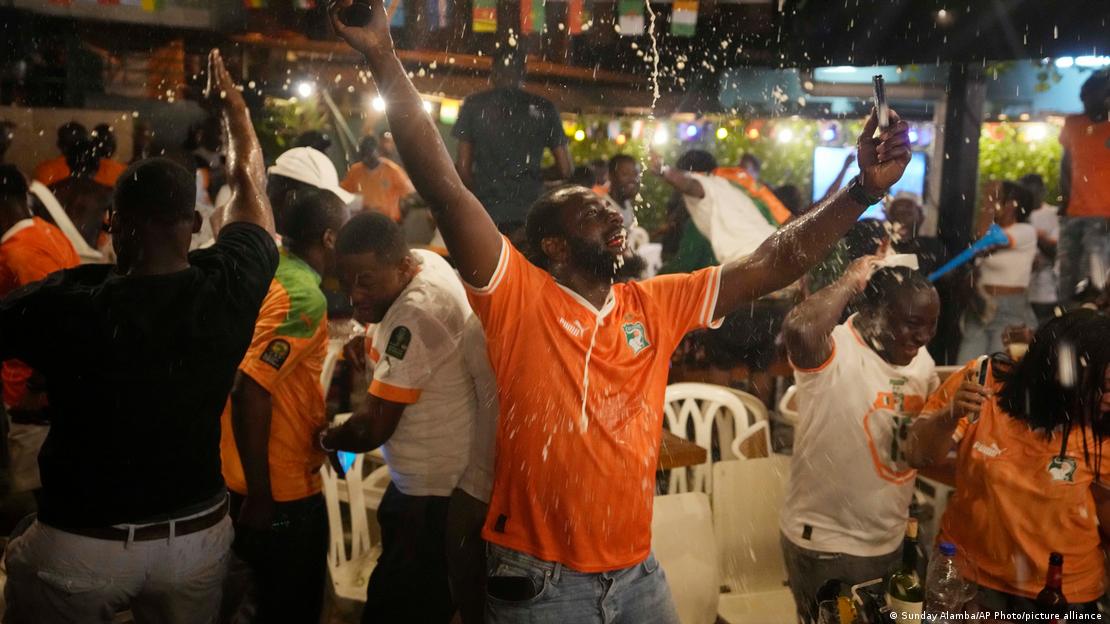 Fans in Abidjan celebrate Ivory Coast's semifinal win over Congo