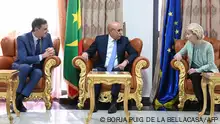 In this handout photo released by La Moncloa on February 8, 2024, European Commission President Ursula von der Leyen (R) and Spanish Prime Minister Pedro Sanchez (L) meet with Mauritanian President Mohamed Ould Ghazouani in Nouakchott. (Photo by Borja Puig de la BELLACASA / LA MONCLOA / AFP) / RESTRICTED TO EDITORIAL USE - MANDATORY CREDIT AFP PHOTO / LA MONCLOA / BORJA PUIG DE LA BELLACASA - NO MARKETING NO ADVERTISING CAMPAIGNS - DISTRIBUTED AS A SERVICE TO CLIENTS