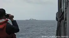 August 19, 2023, Taipei, Taipei City, Taiwan: In this handout provided by the TAIWAN DEFENSE MINISTRY, a Taiwanese naval soldier on board Tian Dan frigate is seen monitoring Chinese frigate Xuzhou using a binocular, as Chinese PLA conducts military exercises around the self-governing island. China s military launched joint air and sea patrols around Taiwan this weekend following the conclusion of a summit between leaders from the United States, Japan and South Korea to shore up alliance, amid Beijing s increasing military presence in the region. Taipei Taiwan - ZUMAh165 20230819_zih_h165_003 Copyright: xROCx