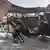 Рятувальники виносять тіло людини, яка загинула внаслідок чергового дроновогу удару військ РФ. Харків, 10 лютого 2024 року