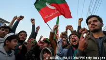 Supporters of Pakistan Tehreek-e-Insaf (PTI) party protest outside the office of a Returning Officer in Peshawar on February 9, 2024, against the alleged rigging in Pakistan's national election results. (Photo by Abdul MAJEED / AFP) (Photo by ABDUL MAJEED/AFP via Getty Images)