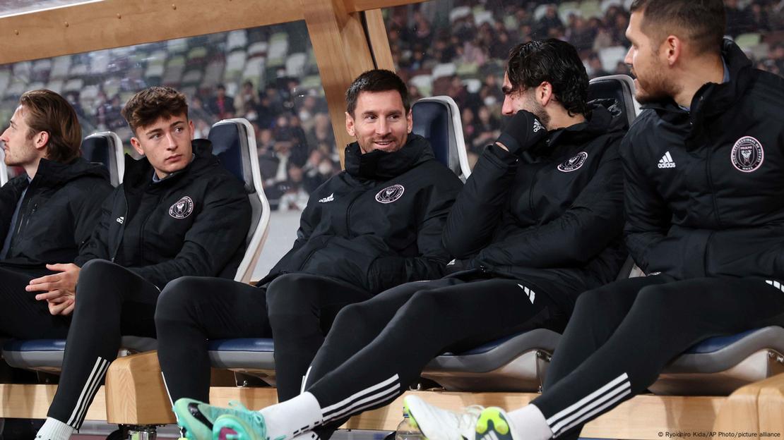 Lionel Messi (C) of Inter Miami CF sits a bench during the first half of the friendly match against Japan's Vissel Kobe at the National Stadium in Shinjuku Ward, Tokyo on Feb. 7, 2024.