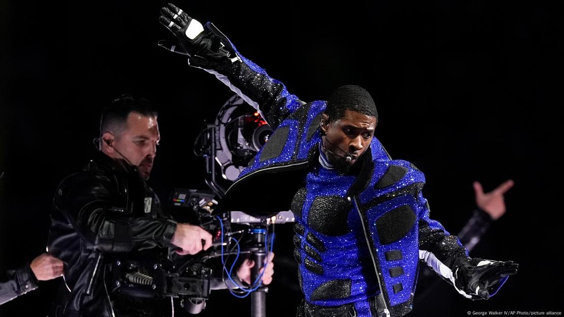 Usher performs during halftime of the NFL Super Bowl 58 football game between the San Francisco 49ers and the Kansas City Chiefs
