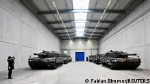 12/02/2024 *** A view of Leopard 2 tanks at a production line as German Chancellor Olaf Scholz and Defence Minister Boris Pistorius visit the future site of an arms factory where weapons maker Rheinmetall plans to produce artilleries from 2025, in Unterluess, Germany February 12, 2024. REUTERS/Fabian Bimmer/Pool