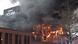 Smoke rises from a fire that has broken out in Liseberg amusement park's new water world Oceana in Gothenburg