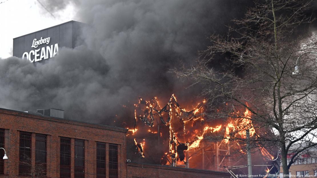 Smoke rises from a fire that has broken out in Liseberg amusement park's new water world Oceana in Gothenburg