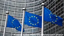 European Union flags are seen near the Barlaymont European Commission building in Brussels, Belgium on June 21, 2023. (Photo by Jakub Porzycki/NurPhoto)