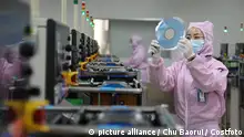BINZHOU, CHINA - JANUARY 9, 2022 - A worker produces semiconductors at a workshop of a semiconductor manufacturer in Binzhou, East China's Shandong Province, Jan 9, 2022.