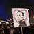 A sign with an image of Russian opposition leader Alexei Navalny