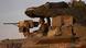 An Israeli soldier watches from the turret of his armored vehicle in southern Israel near the Gaza border An Israeli soldier watches from the turret of his armored vehicle in southern Israel near the Gaza border
