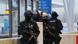 A heavily armed SWAT team at Wuppertal's main train station A heavily armed SWAT team at Wuppertal's main train station