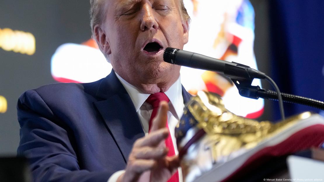 Donald Trump speaking while presenting golden sneakers at Pennsylvania sneaker convention