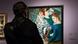 A man stands in front of the Helene Funke's painting "In the Theatre Box" in the Thyssen Bornenisza National Museum, Madrid, Spain. A man stands in front of the Helene Funke's painting "In the Theatre Box" in the Thyssen Bornenisza National Museum, Madrid, Spain.