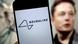 Логотип компании Neuralink на фоне Илона Маска Логотип компании Neuralink на фоне Илона Маска