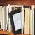 an ebook reader stands out among a row of traditional books