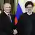 Der russische Präsident Wladimir Putin mit dem verstorbenen iranischen Präsidenten Ebrahim Raisi bei einem Treffen im Dezember 2023 in Moskau