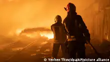 KHARKIV, UKRAINE - FEBRUARY 10: Firefighters try to extinguish the fire as smoke and flames raise after a gas station in the Nemyshlyan district targetted and hit by the Russian shahed drones in Kharkiv, Ukraine on February 10, 2024. At least seven people, including three children, died in a fire caused by a Russian airstrike on the Ukrainian city of Kharkiv Friday night, head of local military administration Oleh Synehubov said. The strike hit a fuel tank, causing a leak and the substance to inflame, Synehubov said on Telegram on Saturday, adding that the fire spread to the nearby residential unit primarily consisting of private houses. Yevhen Titov / Anadolu