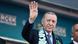 Recep Tayyip Erdogan greets the crowd with a wave at his party's campaign rally Recep Tayyip Erdogan greets the crowd with a wave at his party's campaign rally