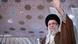 Ali Khamenei, turbaned, bearded man with raised arm Ali Khamenei, turbaned, bearded man with raised arm