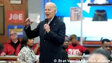 FILE - President Joe Biden meets with UAW members during a campaign stop at a phone bank in the UAW Region 1 Union Hall, Feb. 1, 2024, in Warren, Mich. (AP Photo/Evan Vucci, File)