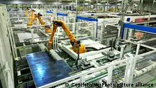 NANTONG, CHINA - AUGUST 23, 2023 - A robot arm produces solar photovoltaic modules at a smart workshop in Nantong, Jiangsu province, China, August 23, 2023. (Photo by Costfoto/NurPhoto)
