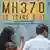 Женщина пишет на стене мероприятия, организованного родственниками пассажиров на 10-летие со дня крушения рейса MH370 авиакомпании Malaysia Airlines